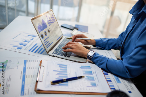 Financial Business tax analyze the graph of the company's performance to create profits and growth, Market research reports and income statistics, Financial and Accounting tax concept.