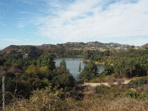 Lake Hollywood Park with scenic reservoir and dry hills landscape in Los Angeles, California, USA