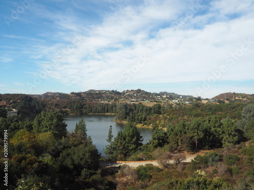 Lake Hollywood Park with scenic reservoir and dry hills landscape in Los Angeles, California, USA