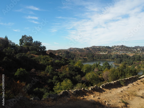 Lake Hollywood Park with scenic reservoir and dry hills landscape in Los Angeles, California, USA