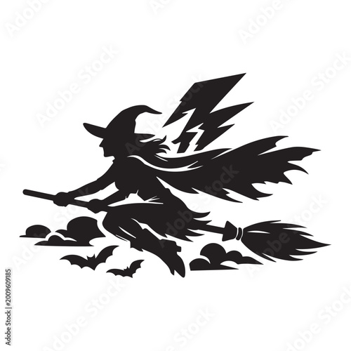 Photos Witch silhouette flying on broomstick during a lightning storm