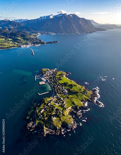 Aerial view of a small coastal town on a green island