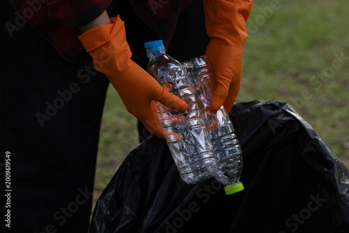 Photography Waste collection workers recycling plastic and garbage on city street, promoting environmental conservation, teamwork, sanitation services, and sustainable waste management practices