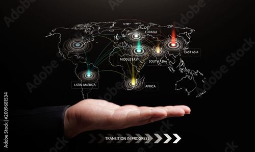 Cuadro en lienzo Hand holding digital world map with regional power centers, connection lines, and transition arrows