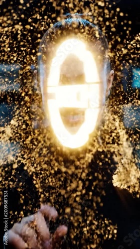 A person face is illuminated by a glowing geometric digital construct