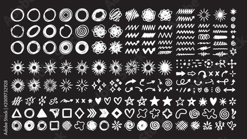 Large collection of white hand-drawn doodle elements, sketches, arrows, stars, circles, and abstract shapes on a black background