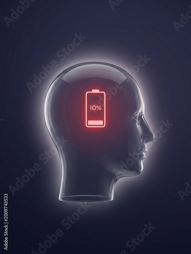 Mental exhaustion concept — human head with low battery icon