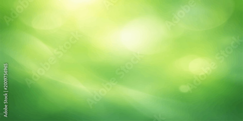 Green abstract bokeh background with soft light blur and bright natural summer colors suitable for wallpaper design