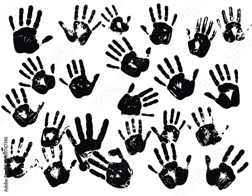 Many black hand prints on white.