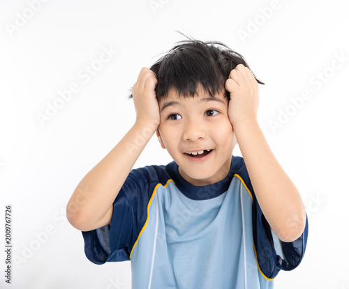 The boy's embarrassed expression