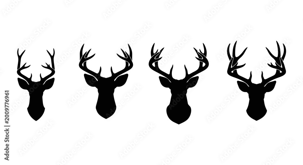 Fototapeta premium Collection of black deer head silhouettes with antlers on a white background
