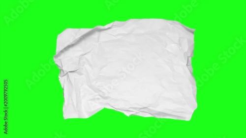 Crumpled white paper isolated on green screen background, wrinkled texture sheet for design mockup, Chroma key backdrop, creative overlay element, high resolution 4k