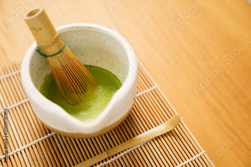Japanese matcha tea ceremony equipment on wooden table