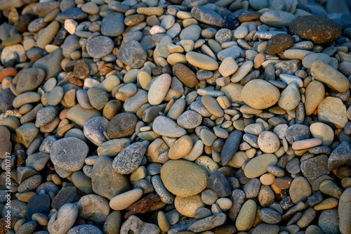 Obraz na płótnie Closeup of sea stones in Cyprus as natural background