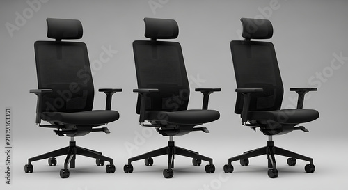Three modern black office chairs lined up
