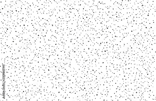 Fine black dots pattern scattered across a clean white background, for minimalist texture