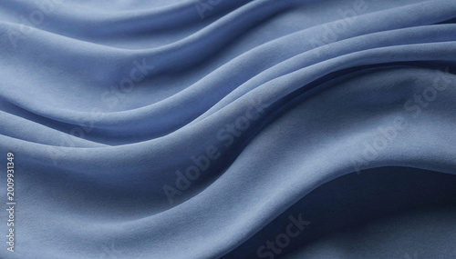Fotografía Soft Blue Fabric Drapes With Smooth Waves And Gentle Folds Texture Background