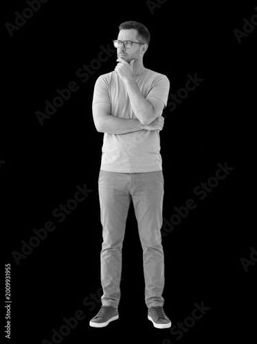 Man in blue shirt with thoughtful expression on transparent background