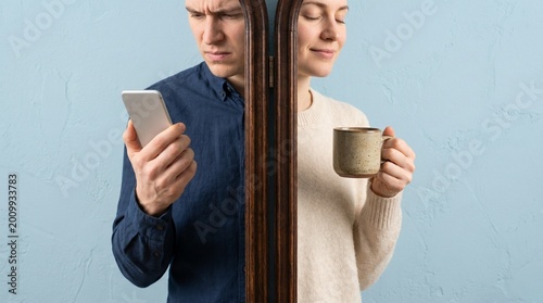 Contrasting lifestyles of a man and woman divided by a partition