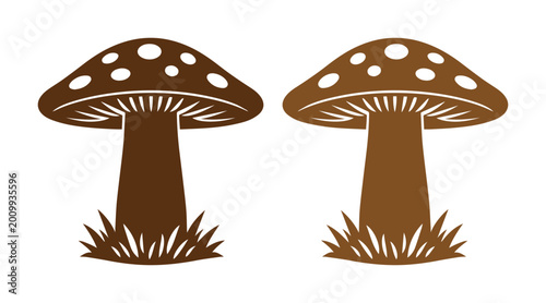 Tableau sur toile Brown mushroom vector icon set, two spotted fungi silhouettes with grass, natural forest element graphic for nature designs and organic themes
