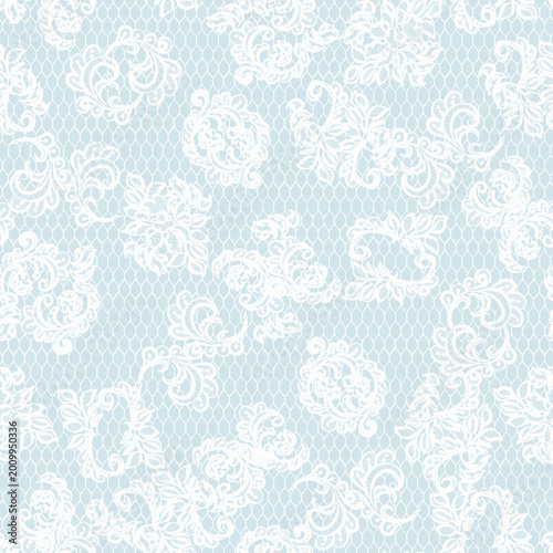 White lace seamless pattern forming a delicate ornamental floral design on a light blue background, creating an elegant textile texture and retro wallpaper for wedding concepts
