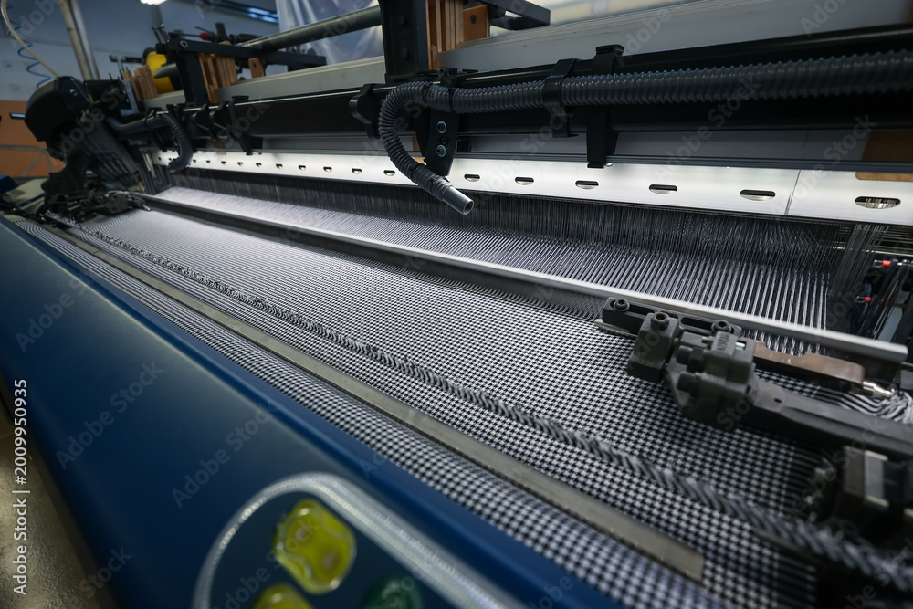 Wall Mural A machine for the production of fabrics