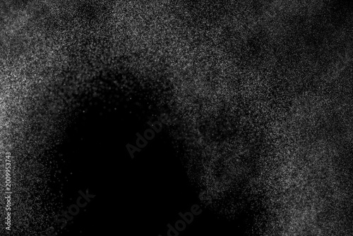 Water spray mist particle abstract black background texture