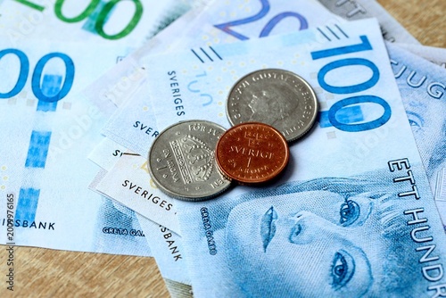 Obraz na plátně Swedish krona money bills and coins on table