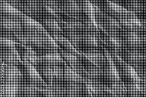 Foto Crinkled gray paper texture fills the frame with sharp folds.