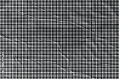 Foto A close-up view of a crumpled gray fabric surface with many wrinkles