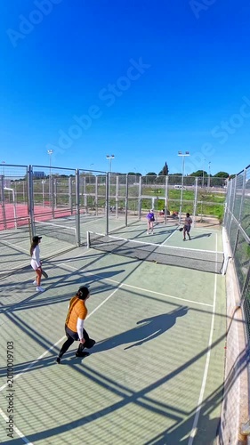 High angle view of people playing pickleball outdoors