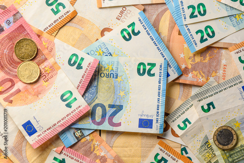 Mixed euro banknotes 5, 10, 20, 50 on table