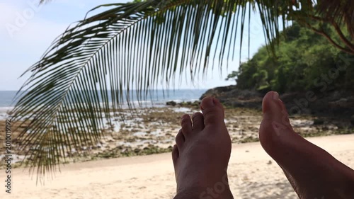 Enjoying Relaxation by the Shore, with My Feet in the Sand and a Stunning Ocean View