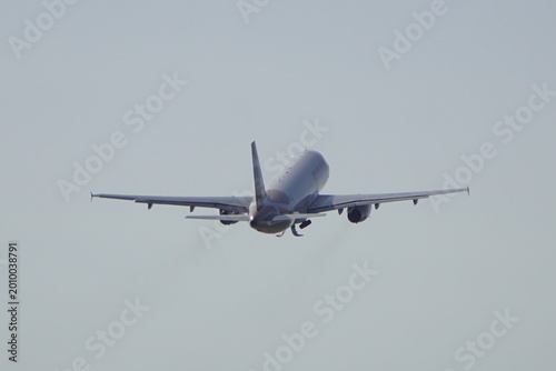 Quadro su tela airplane in the sky after take off from the runway
