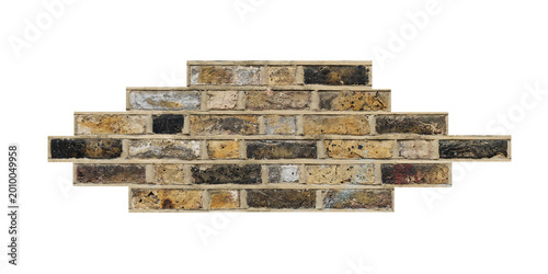 A piece of weathered brown brick wall.