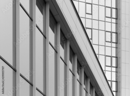 Black and white modern building facade with repeating vertical lines and windows. Geometric architectural exterior with abstract urban texture.