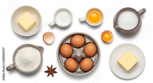 Baking ingredients on white background, eggs, butter, flour, milk