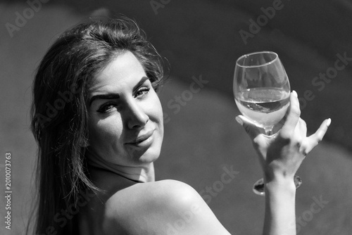 Obraz na plátně Woman holding glass of wine
