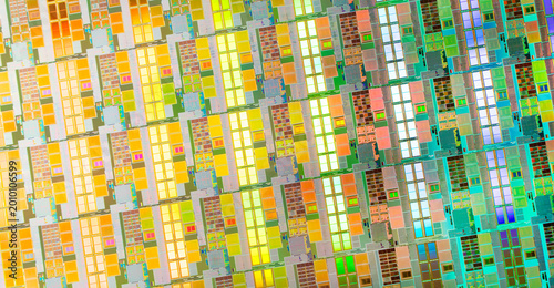  High-tech Macro Photography of a Colorful Silicon Wafer with Microchip Patterns for AI Hardware and Semiconductor Industry Concept.
