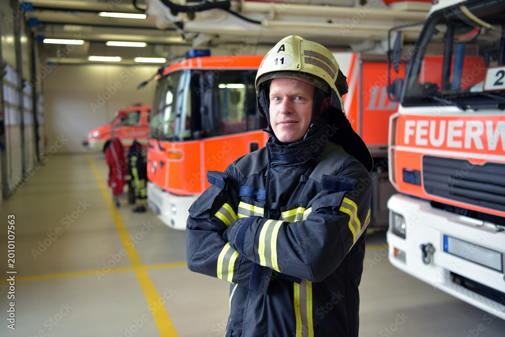Fototapeta premium portrait of a firefighter in the operations centre at the fire-fighting vehicle
