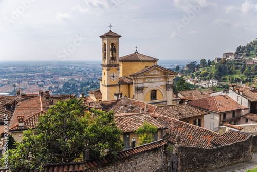 Konstfotografi Historic Santa Grata Inter Vites church and rooftops of Bergamo Citta Alta with