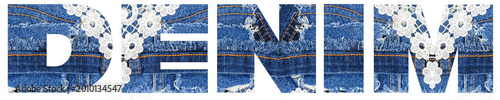Billede på lærred Denim fabric with lace patterns on a textile surface in a close up view during d