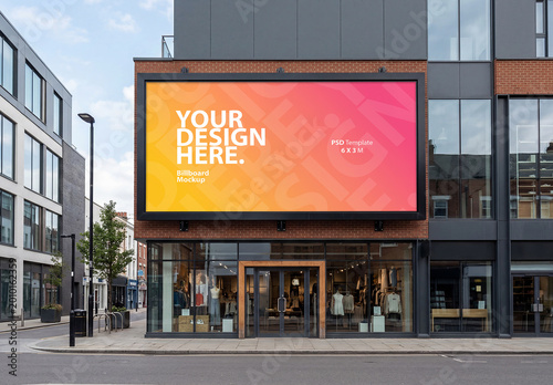 Large horizontal billboard poster Mockup on a wall above storefront