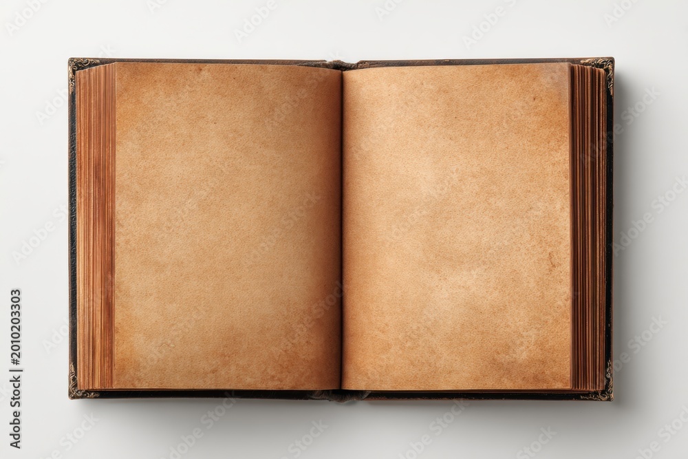 Fototapeta premium Open antique book with aged parchment pages on a white background.