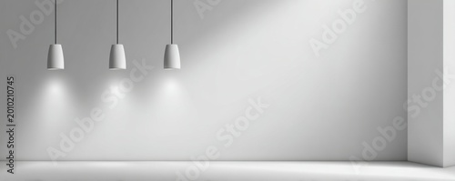Minimalist interior with three pendant lights casting shadows on a white wall.