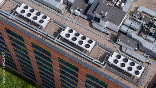 Fotografie High angle aerial view of industrial HVAC units on an office building rooftop, modern ventilation and cooling system infrastructure