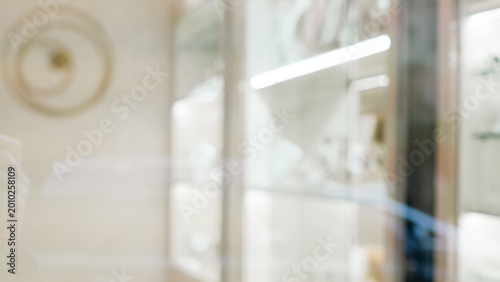 blurred background of a luxury jewelry store or high end boutique interior.