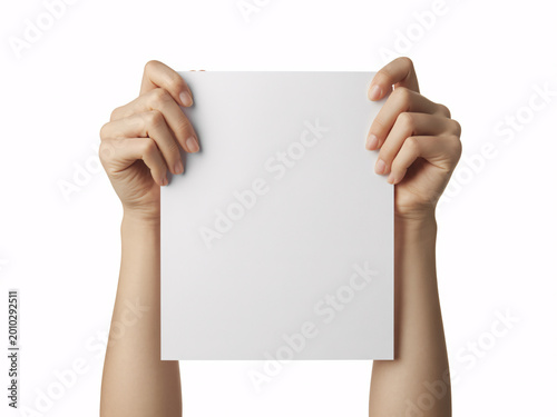 Hands holding blank white card for advertising and branding, isolated on white background