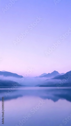 Serene Foggy Mountain Lake at Dawn with Purple Pastel Hues and Water Reflection