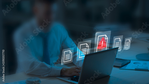 Businessman Using Laptop with Data Information Privacy and Document Management Hacking and Spam Warning Symbol. Cyber Attack Network, Virus, Spyware, Cyber Security and Cybercrime